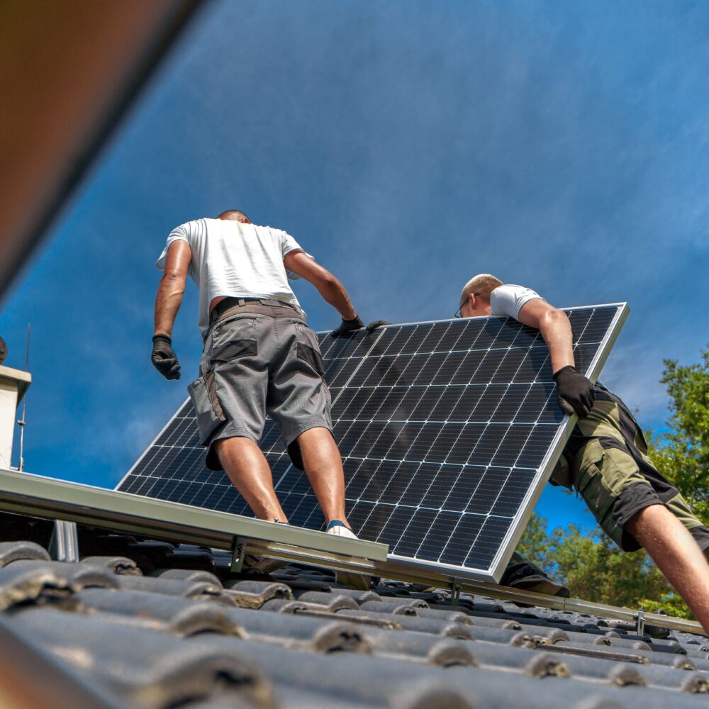 men-worker-installing-solar-photovoltaic-panels-on-2023-11-27-05-29-23-utc